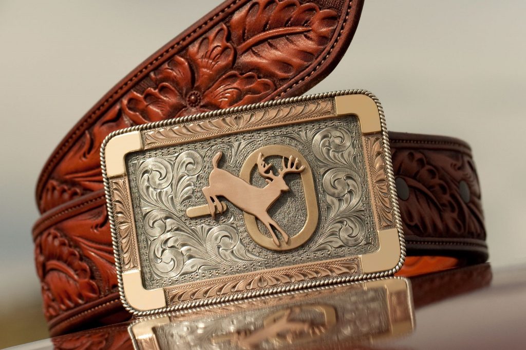 Rhinestone Cowboy: Clint Orms's Custom Belt Buckles a Work of Art